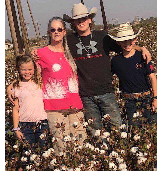 Memaw and kids in cotton field2