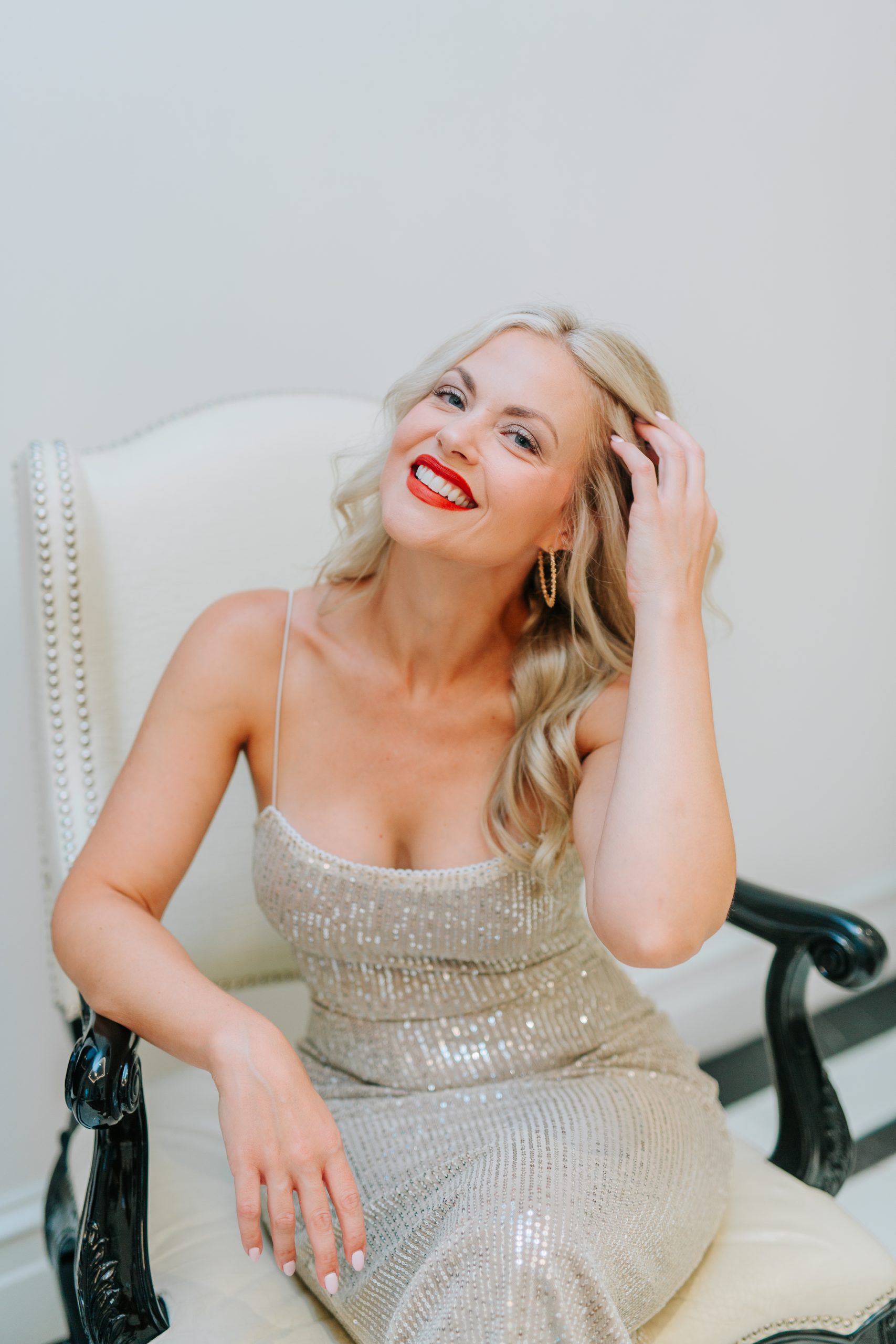 Image of Linda Kozar with a book shelf in background